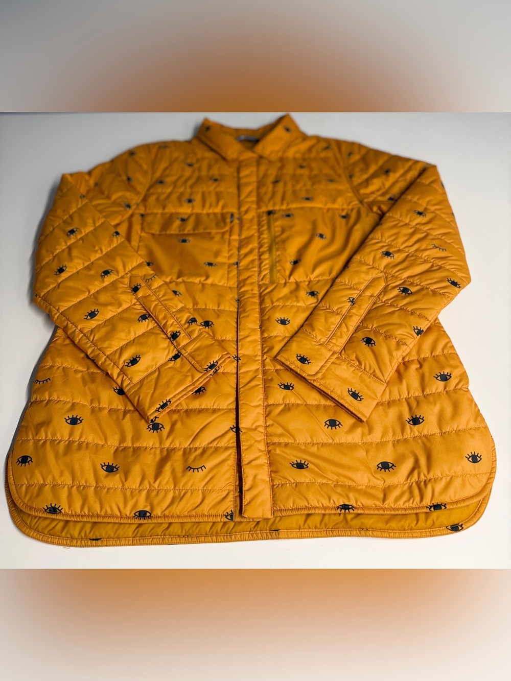 The North Face Kids' Yellow Quilted Puffer with Eye Print